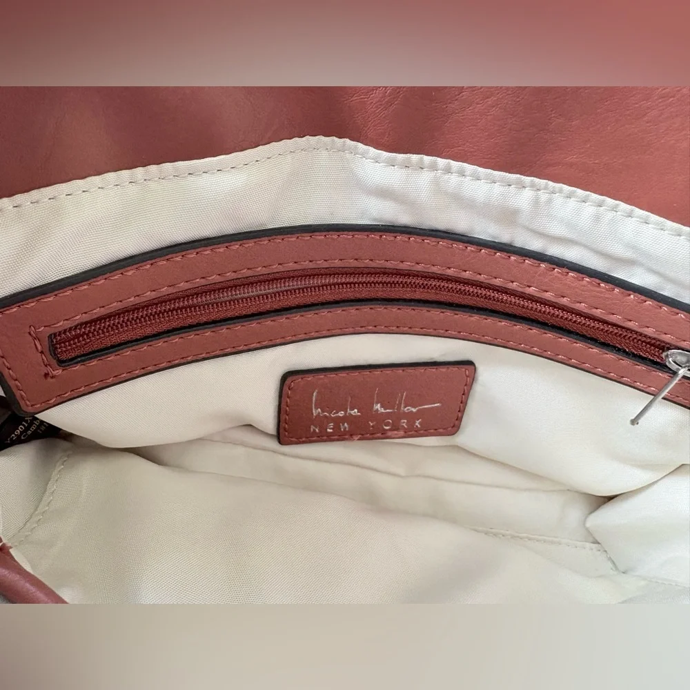 Nicole Miller Handbag Laura Small Crossbody Brown zipper detail front. Very soft